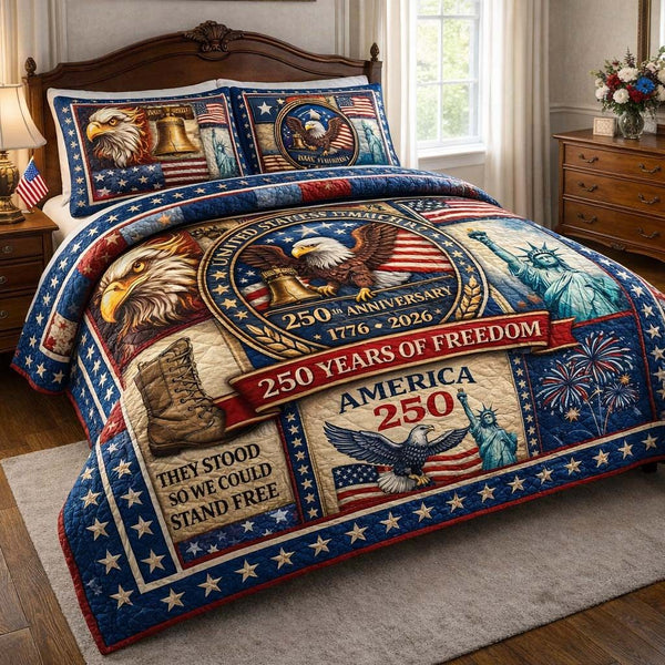 American Valor quilted 3-piece bedding set on a made bed in a warmly lit bedroom
