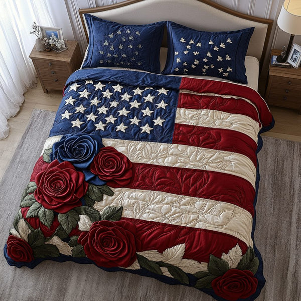 Americana Bloom quilted 3-piece bedding set on a made bed in a warmly lit bedroom