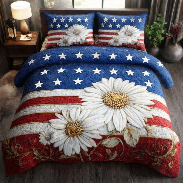 Americana Bloom quilted 3-piece bedding set on a made bed in a warmly lit bedroom