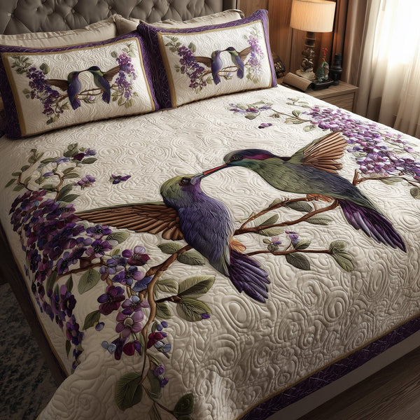Amethyst Love quilted 3-piece bedding set on a made bed with two matching pillow shams