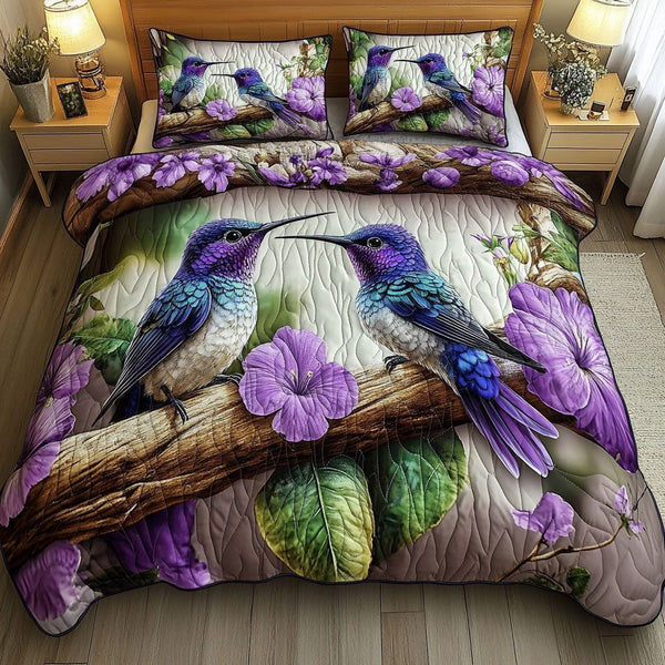 Amethyst Lovebirds quilted 3-piece bedding set on a made bed with two matching pillow shams