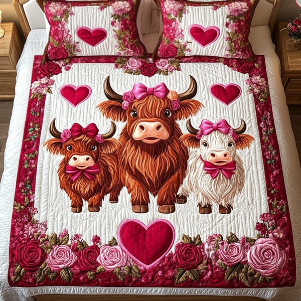 Amour Herd quilted 3-piece bedding set on a made bed with two matching pillow shams