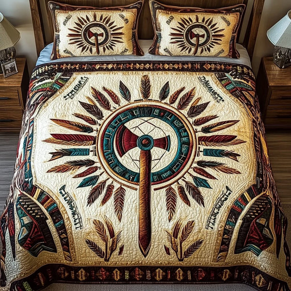 Ancestors Legacy quilted 3-piece bedding set on a made bed with two matching pillow shams