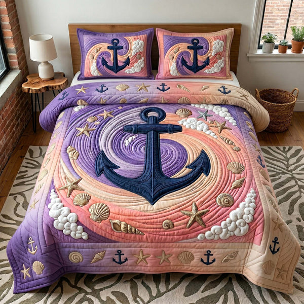 Anchor Breeze quilted 3-piece bedding set on a made bed in a light coastal bedroom