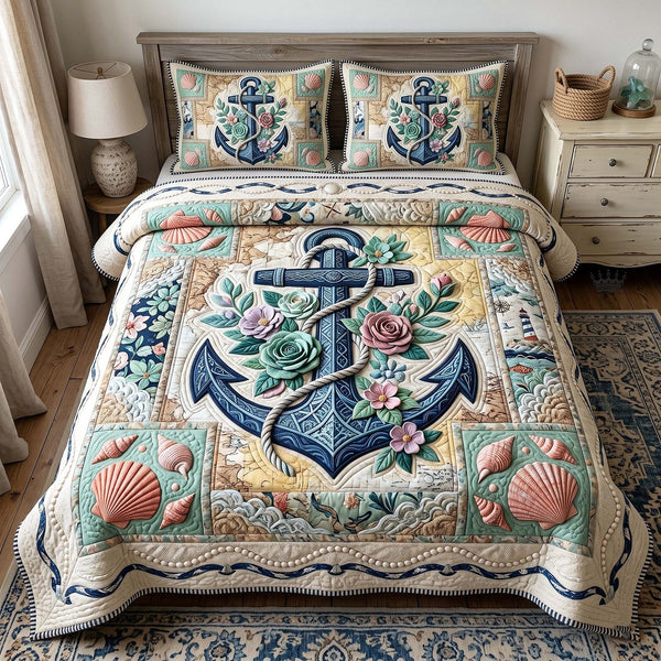 Anchor Breeze quilted 3-piece bedding set on a made bed in a light coastal bedroom