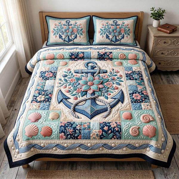 Anchor Breeze quilted 3-piece bedding set on a made bed in a light coastal bedroom