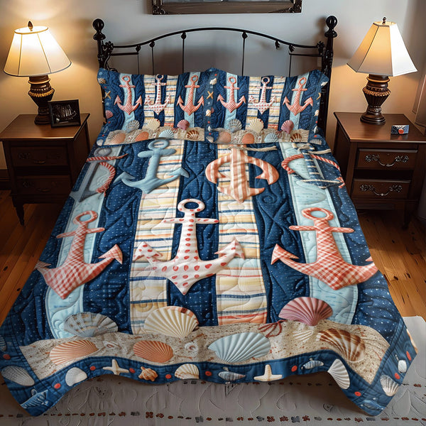 Anchored Bliss quilted 3-piece bedding set on a made bed in a light coastal bedroom