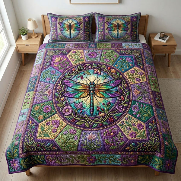 Ancient Dragonfly quilted 3-piece bedding set on a made bed with two matching pillow shams
