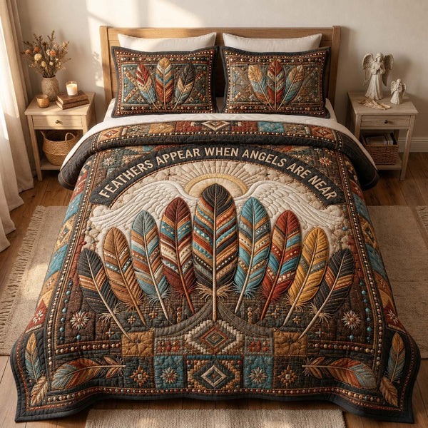 Angel Feather Blessing quilted 3-piece bedding set on a made bed in a softly lit bedroom