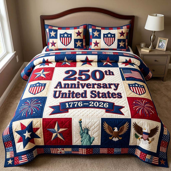 Anniversary Honor quilted 3-piece bedding set on a made bed in a warmly lit bedroom