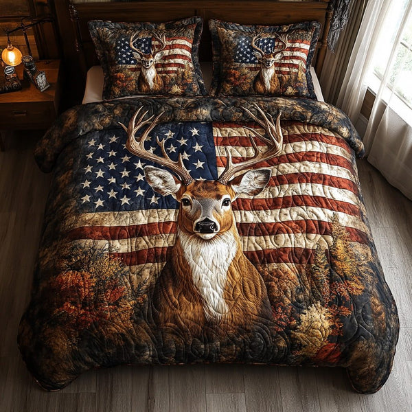 Antler Grove quilted 3-piece bedding set on a made bed with two matching pillow shams