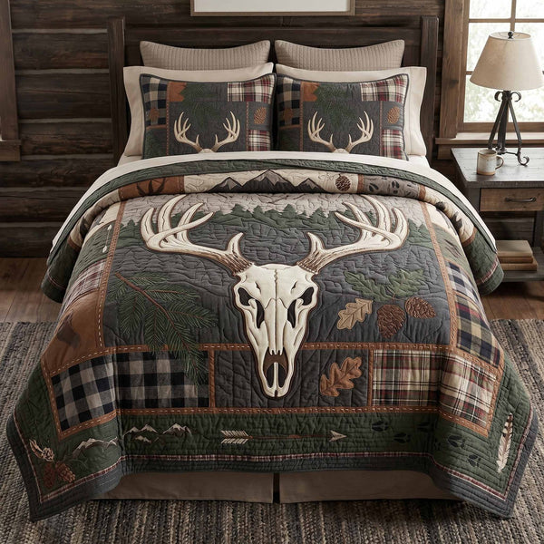 Antler Lodge quilted 3-piece bedding set on a made bed with two matching pillow shams