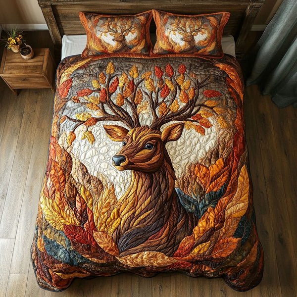 Antlered Blossoms quilted 3-piece bedding set on a made bed with two matching pillow shams