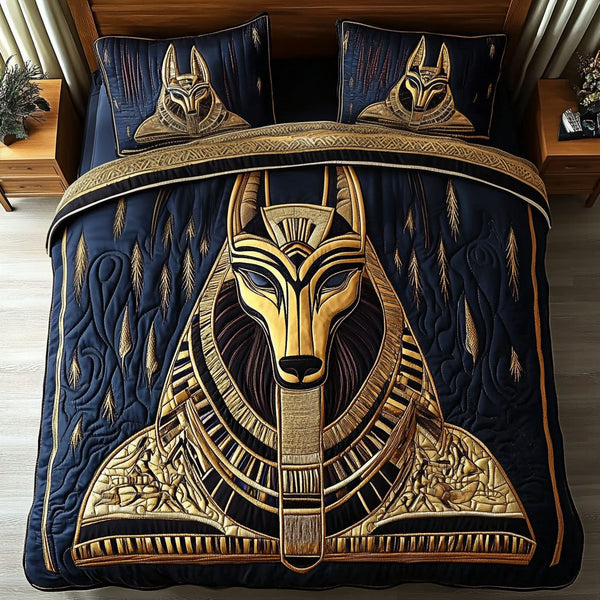 Anubis Majesty quilted 3-piece bedding set on a made bed with two matching pillow shams