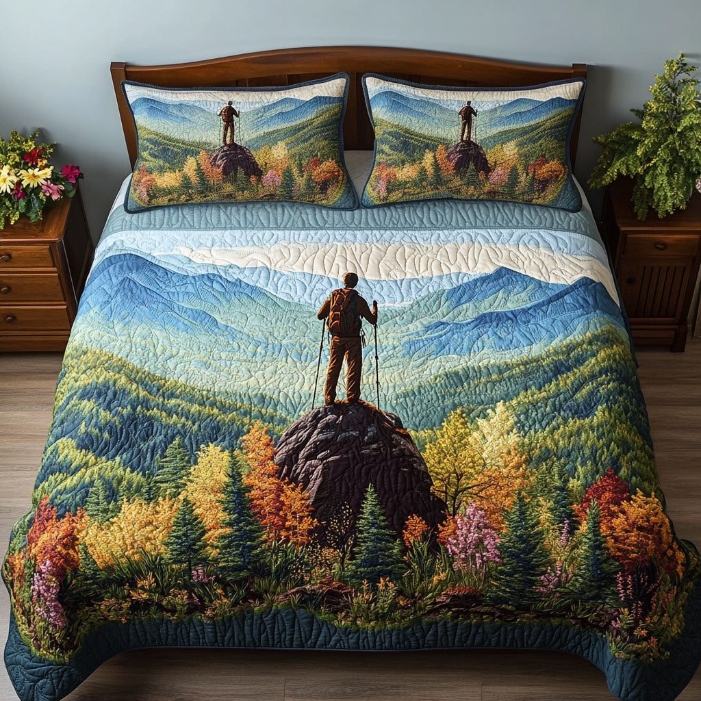 Appalachian Trek quilted 3-piece bedding set on a made bed with two matching pillow shams