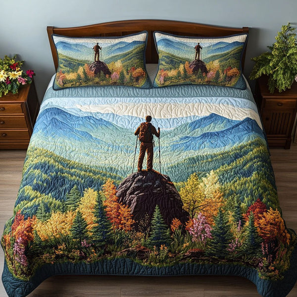 Appalachian Trek quilted 3-piece bedding set on a made bed with two matching pillow shams