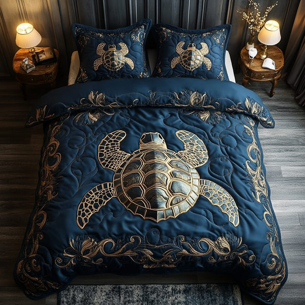 Aqua Compass quilted 3-piece bedding set on a made bed with two matching pillow shams