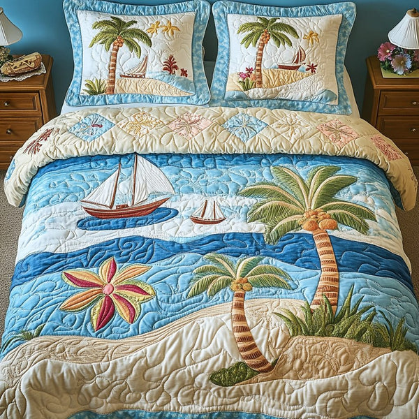 Aqua Dream quilted 3-piece bedding set on a made bed with two matching pillow shams