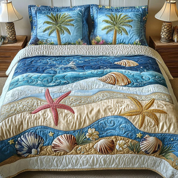 Aqua Drift quilted 3-piece bedding set on a made bed with two matching pillow shams