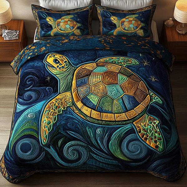 Aqua Mirage quilted 3-piece bedding set on a made bed with two matching pillow shams