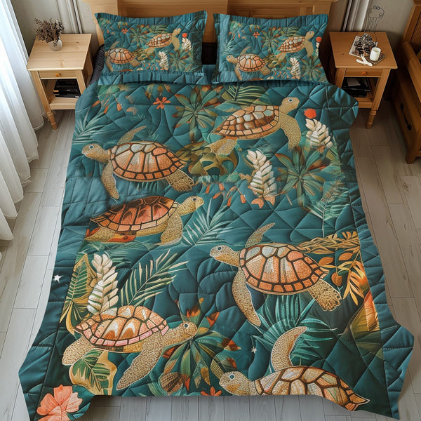 Aqua Oasis quilted 3-piece bedding set on a made bed with two matching pillow shams