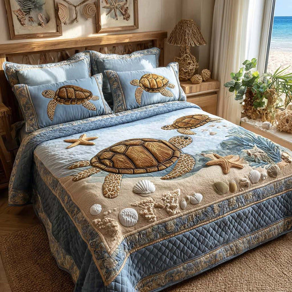 Aqua Serenity quilted 3-piece bedding set on a made bed with two matching pillow shams