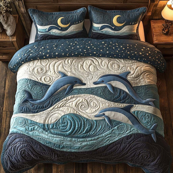 Aqua Spirit quilted 3-piece bedding set on a made bed with two matching pillow shams