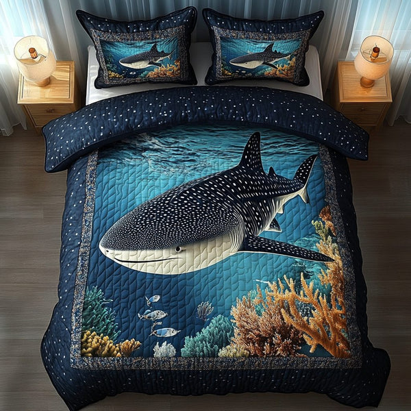 Aqua Voyager quilted 3-piece bedding set on a made bed with two matching pillow shams