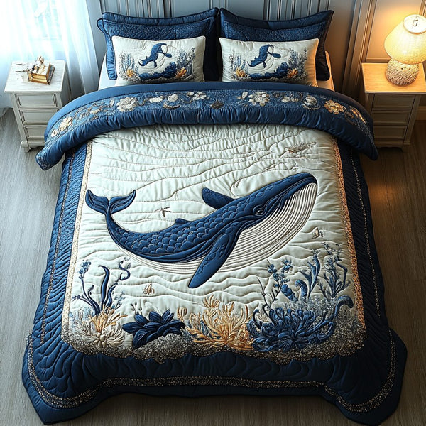 Aquatic Amaze quilted 3-piece bedding set on a made bed with two matching pillow shams