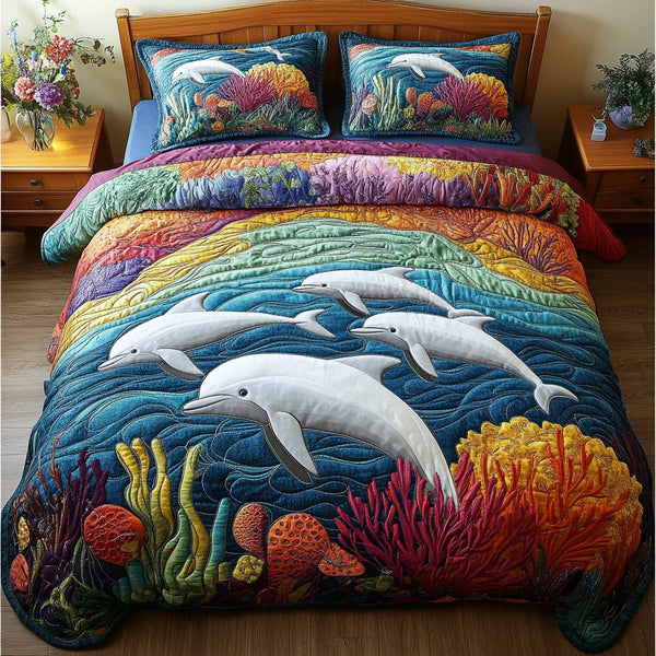 Aquatic Leap quilted 3-piece bedding set on a made bed with two matching pillow shams