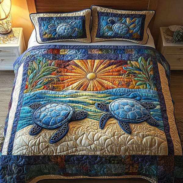 Aquatic Odyssey quilted 3-piece bedding set on a made bed with two matching pillow shams