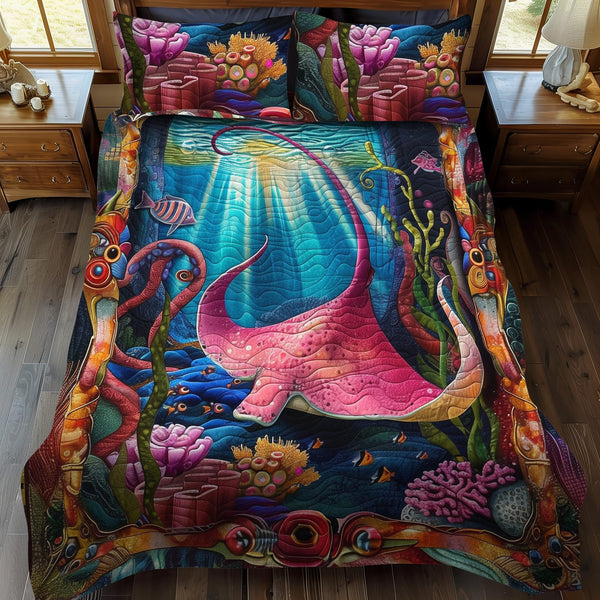 Aquatic Wonders quilted 3-piece bedding set on a made bed with two matching pillow shams