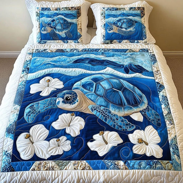 Arctic Drift quilted 3-piece bedding set on a made bed with two matching pillow shams