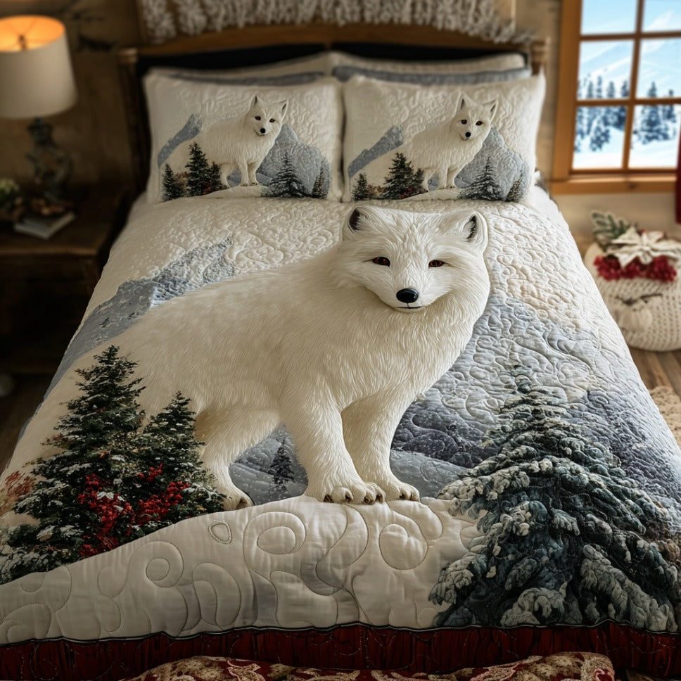 Arctic Fox Charm quilted 3-piece bedding set on a made bed with two matching pillow shams