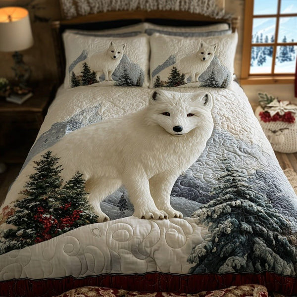Arctic Fox Charm quilted 3-piece bedding set on a made bed with two matching pillow shams