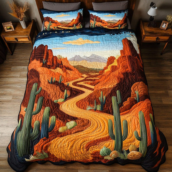Arizona Peaks quilted 3-piece bedding set on a made bed with two matching pillow shams