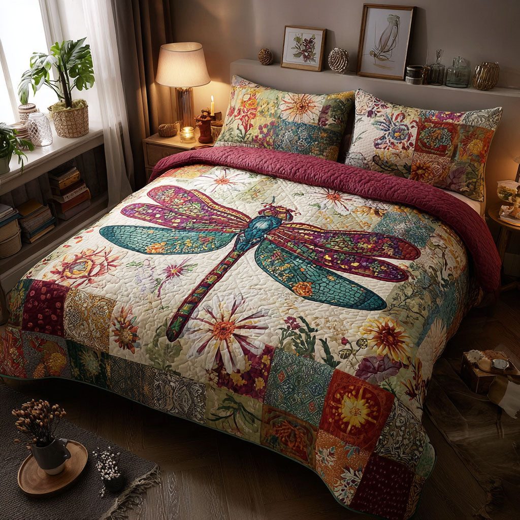Artistic Flight quilted 3-piece bedding set on a made bed with two matching pillow shams