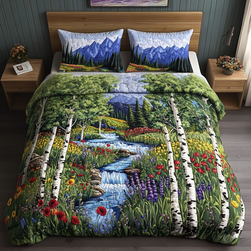 Aspen Wildflowers Path quilted 3-piece bedding set on a made bed with two matching pillow shams