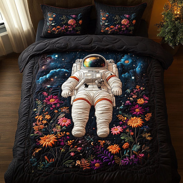 Astral Odyssey quilted 3-piece bedding set on a made bed with two matching pillow shams