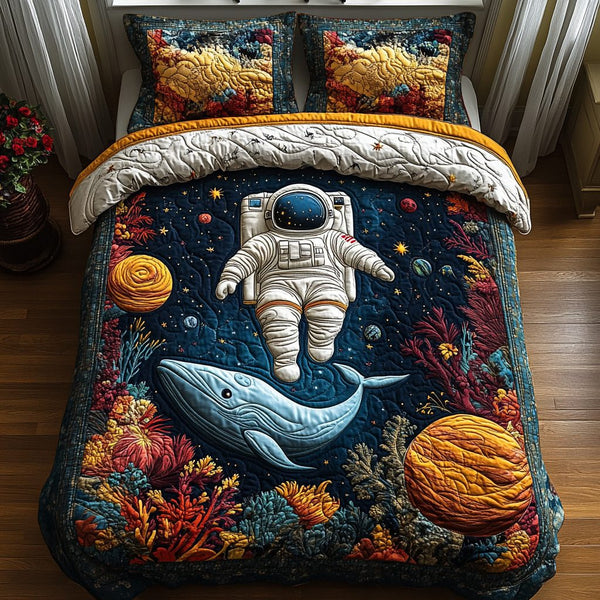 Astronaut in the Ocean quilted 3-piece bedding set on a made bed in a light coastal bedroom