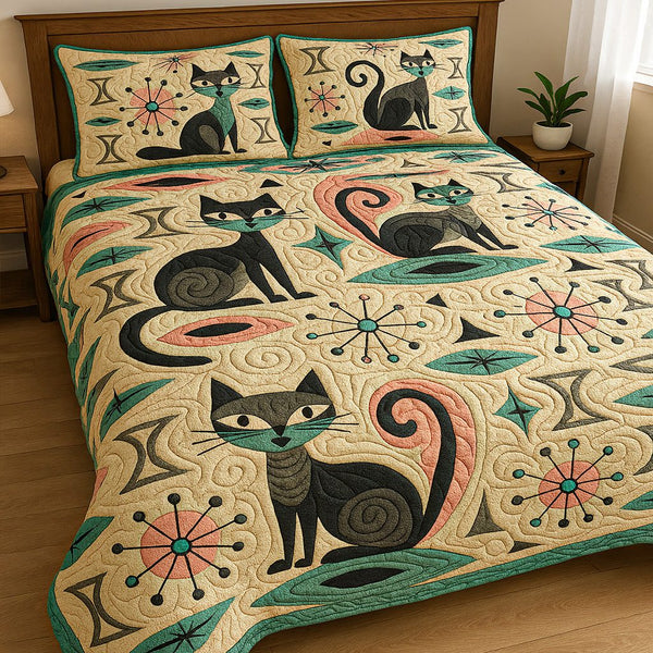 Atomic Catscape quilted 3-piece bedding set on a made bed with two matching pillow shams