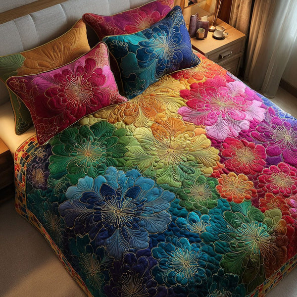 Aurora Bloom quilted 3-piece bedding set on a made bed with two matching pillow shams