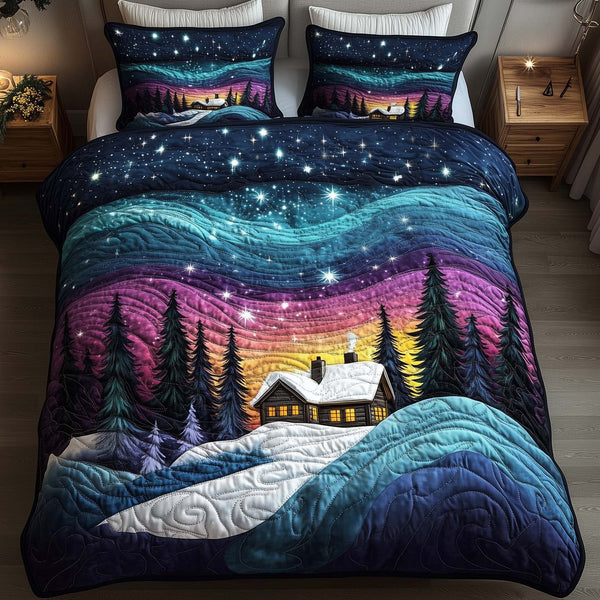 Aurora Borealis quilted 3-piece bedding set on a made bed with two matching pillow shams
