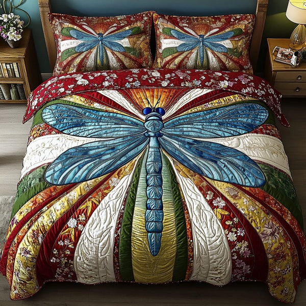 Aurora Flyer quilted 3-piece bedding set on a made bed with two matching pillow shams