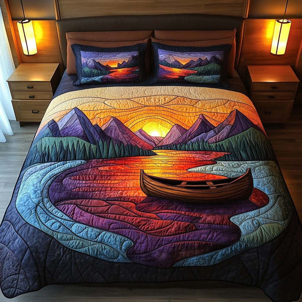 Aurora Lake quilted 3-piece bedding set on a made bed with two matching pillow shams