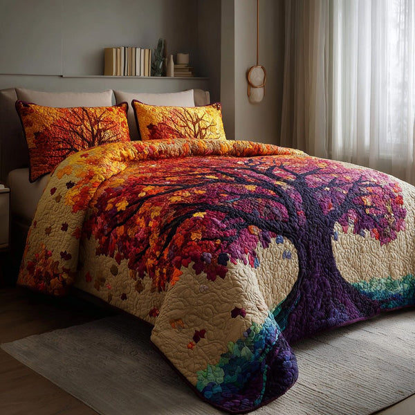 Autumn Aura quilted 3-piece bedding set on a made bed with two matching pillow shams