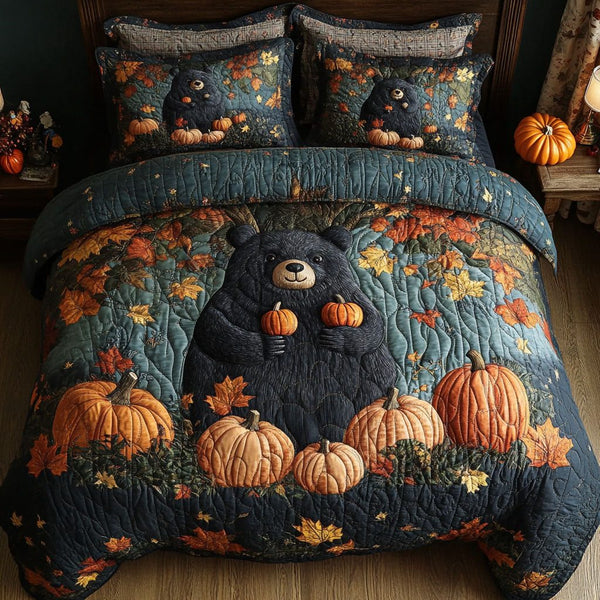 Autumn Bear Trek quilted 3-piece bedding set on a made bed with two matching pillow shams