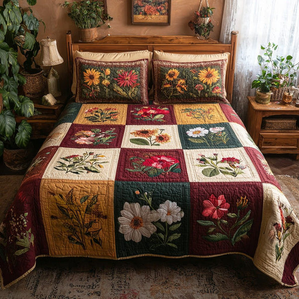 Autumn Blooms quilted 3-piece bedding set on a made bed with two matching pillow shams