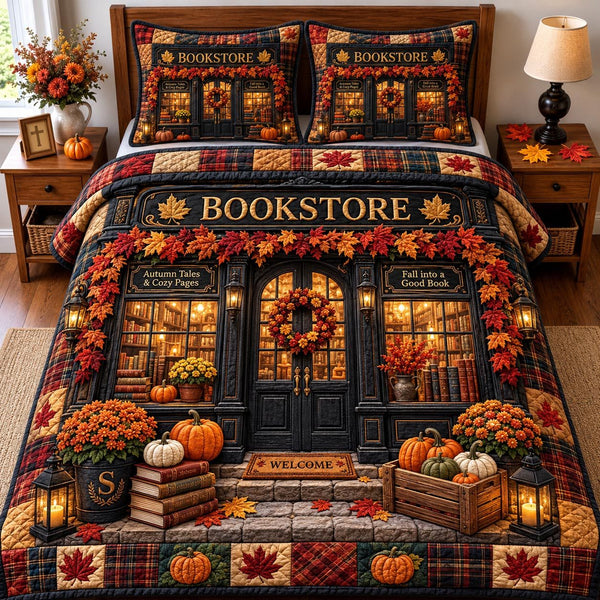 Autumn Bookshop quilted 3-piece bedding set on a made bed with two matching pillow shams