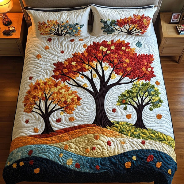 Autumn Breeze quilted 3-piece bedding set on a made bed with two matching pillow shams